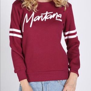 red long sleeve with white stripes in sleeves